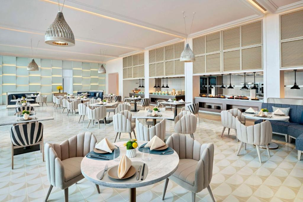 THE MERMOON RESORT HAINAN TUFU BAY TAPESTRY COLLECTION BY HILTON